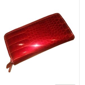 Modapelle red wallet. 2 zippers on top EUC lots of card holders 7 L x 5 W